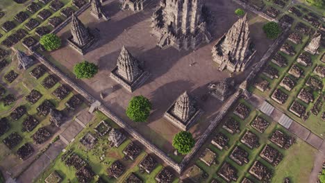 Ancient-Hindu-temple-in-Java-seen-from-above-at-sunrise,-Indonesia,-Prambanan