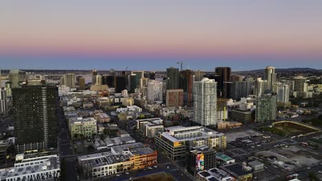 Aerial-view-around-streets-and-buildings-in-downtown-San-Diego,-dawn-in-California,-USA