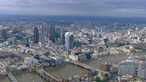 Aerial-shot-of-the-financial-district-in-downtown-London-with-the-Shard-coming-into-shot