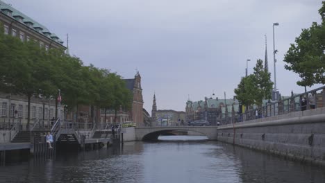 Traveling-along-Copenhagen,-Denmark-canal