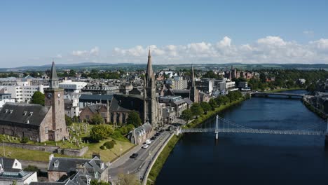 Drone-shot-pulling-away-from-the-Free-Church-of-Scotland-to-reveal-the-surrounding-city-of-Inverness