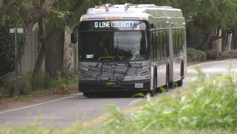 metro-bus-driving-to-station