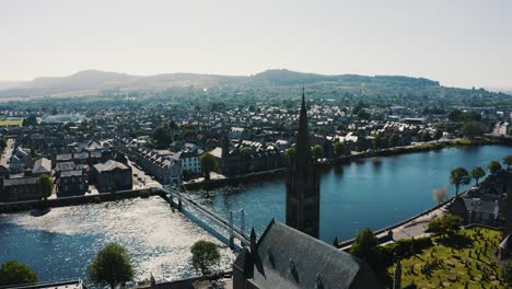 Aerial-view-of-the-Greig-St-Bridge-and-Free-Church-of-Scotland-tower-in-Inverness,-Scotland