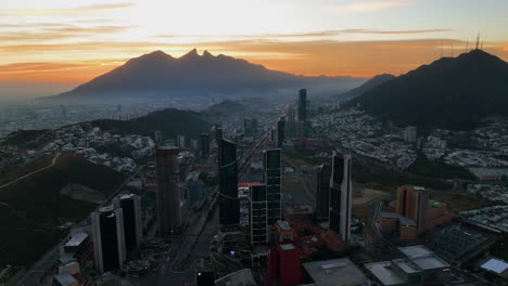 Aerial-view-around-skyscrapers-in-the-San-Pedro-Garza-Garcia,-Monterrey,-sunset-in-Mexico