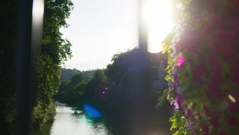 Gate-View-of-Scenic-River-In-Tubingen,-Germany-in-4K-Downtown-Home-of-Europes-Oldest-University-At-Sunset