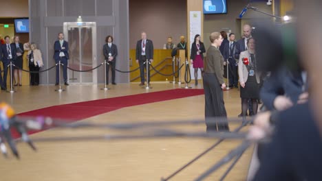 Danish-Prime-Minister-Mette-Frederiksen-talking-to-the-press-in-the-European-Council-building-during-EU-summit-in-Brussels,-Belgium