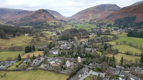 Cinematic-cumbrian-village-landscape,-Aerial-view-of-Grassmere,-village,-town-in-the-English-Lake-District,-UK