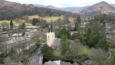 Wonderful-Lake-District-National-Park-cinematic-drone-aerial-video-footage-of-Grasmere-vlllage,-probably-Cumbria’s-most-popular-tourist-village