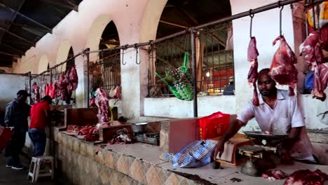Local-tanzanian-people-buying-and-working-in-the-meat-side-of-Darajani-Market-in-Zanzibar