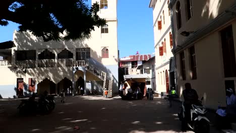 Exterior-establisher-view-of-Muslim-school-in-crowded-area-of-Stone-Town,-Zanzibar