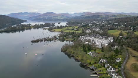 Aerial-Elevated-view-of-Windermere-Lake-District-England-uk-from-bowness-with-boat-sailing-in-summer
