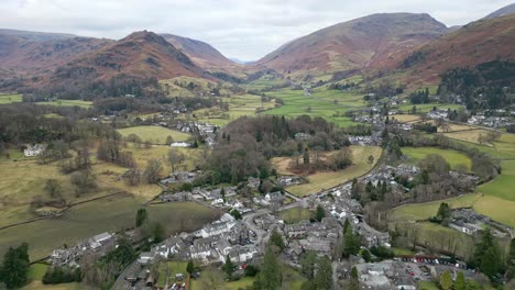 Cumbrian-village-landscape,-Aerial-view-of-Grassmere,-village,-town-in-the-English-Lake-District,-UK