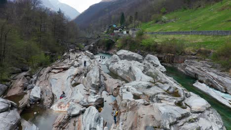 Establisher-aerial-shot-of-Ponte-dei-Salti-in-Lavertezzo,-Ticino,-Switzerland