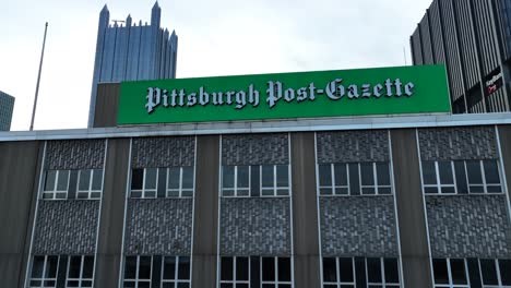 Pittsburgh-Post-Gazette-building-and-logo-in-downtown-Pittsburgh,-PA