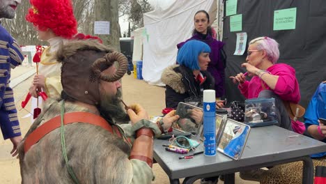 Artists-wearing-different-mythological-costumes-in-the-street-preparing-for-the-Madrid-carnival-parade