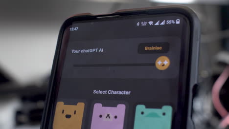 Close-Up-View-Person-Using-ChatGPT-On-Mobile-And-Tapping-On-AI-Levels-Ranging-From-Weird,-Smart-And-Brainiac