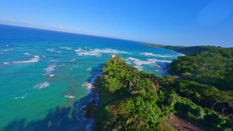 Scenic-drone-FPV-along-tropical-coastline-Playa-El-Breton,-Caribbean