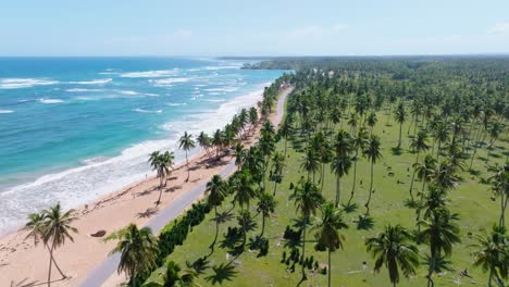Aerial-forward-along-coast-of-Arroyo-Salado-beach,-Cabrera-in-Dominican-Republic