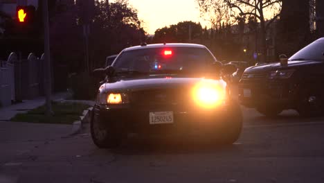 Police-car-with-flashing-lights-and-sirens