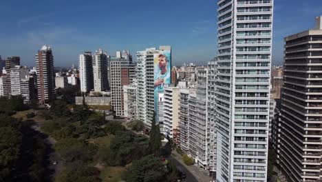 Buildings-of-the-city-of-Rosario,-one-of-them-with-the-emblematic-image-of-Leo-Messi