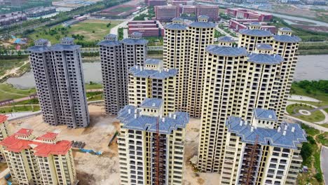 Close-up-aerial-fly-over-tall-Chinese-buildings---dynamic-cinematic-view