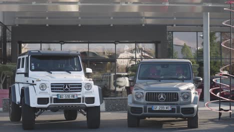 Two-Mercedes-4x4s-in-front-of-the-car-dealership