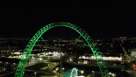 Aerial-view-overlooking-the-Fun-Spot-America-Theme-Parks-–-Kissimmee,-night-in-Orlando,-Florida,-USA---reverse,-drone-shot