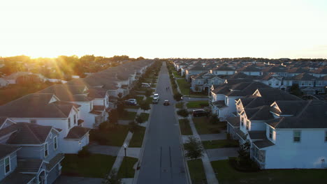 Aerial-view-over-a-street-at-a-wealthy-neighborhood,-sunset-in-Orlando,-Florida,-USA