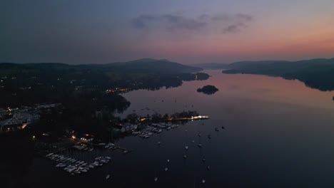 Cinimatic-sunset-footage-of-the-busy-Bowness-Bay-Marina,-Cumbria-English-Lake-District