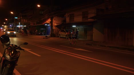Two-runners-during-the-Samui-run,-Koh-Samui-Island,-Malaysia