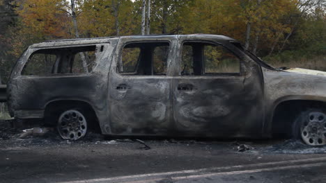 Shot-of-two-smouldering-Royal-Canadian-Mounted-Police-cruisers-following-shale-fracked-gas-protests-in-Elsipogtog-New-Brunswick-on-October-17,-2013-led-by-the-Mi'kmaq-Warrior-Society