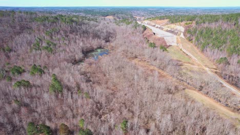 Aerial-of-the-Birmingham-Northern-Beltline,-an-abandoned-highway-project-which-recently-received-approval-of-funds-towards-construction-completion