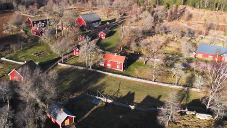 Aerial-Shot-Of-Asens-By-Culture-Reserve-In-Sweden,-Historic-Village-Tourist-Destination