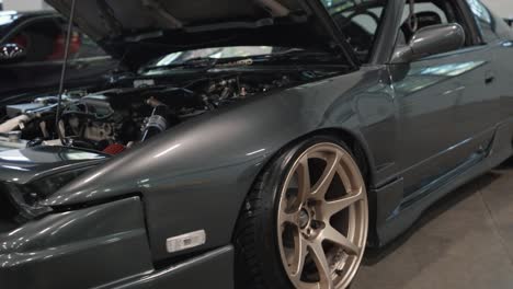 Arc-Shot-of-Modified-Gray-Nissan-240SX-Show-Car-at-Drive-Auto-Show
