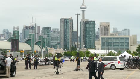 Police-officers-stand-guard-for-security-at-an-event-in-Toronto,-Canada,-August-31,-2021