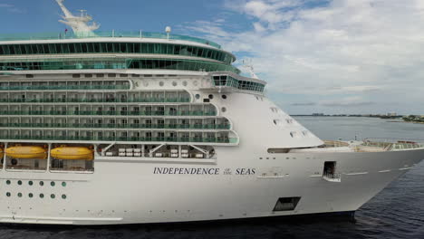 Drone-shot-of-a-docked-cruise-ship-in-the-Cayman-Islands-with-other-ships-nearby