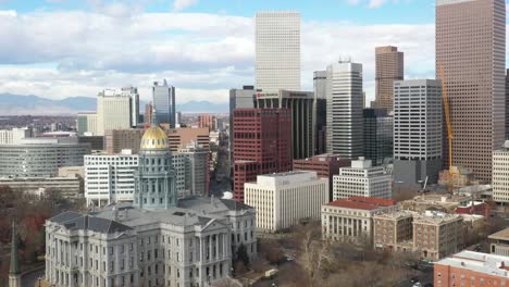 Colorado-state-capitol-and-Denver-skyline-with-drone-moving-down