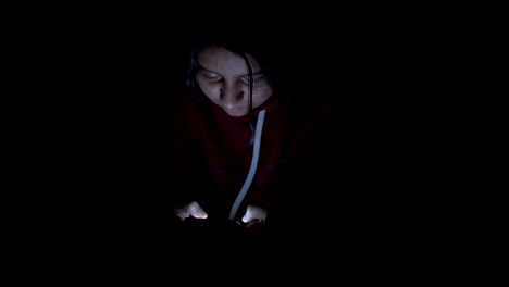 Asian-woman-playing-game-on-smartphone-in-the-bed-at-night,-people,Addict-social-media