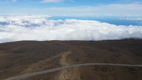 Above-the-Clouds-on-Haleakalā-Volcano-on-Hawaiian-Island-of-Maui,-Aerial