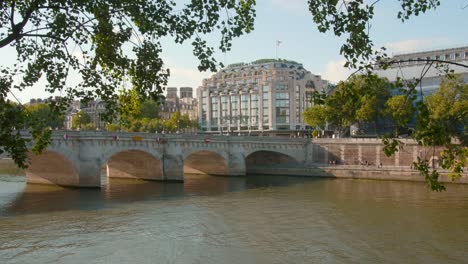 Samaritaine-department-store-outdoor-building-shot-with-the-Pont-Neuf-and-the-Seine-River-banks