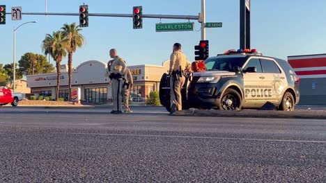 Police-officers-block-lanes-near-car-crash