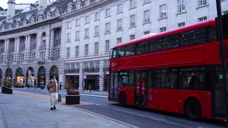 Walking-down-Regent-Street-in-Piccadilly-Circus,-London,-England,-wide-shot-POV