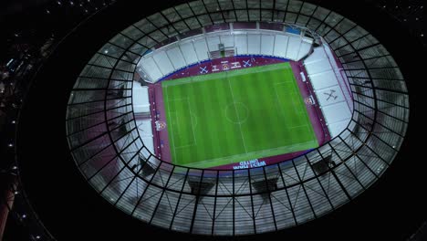 Aerial-View-at-Night-Above-London-Stadium-for-West-Ham-United-F