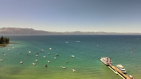 Drone-footage-in-HDR-flying-up-and-over-Zephyr-Cove,-Lake-Tahoe,-Nevada