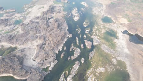 Clear-lake-at-sunset,-aerial-view