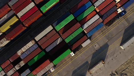 Stacked-Of-Multi-Colored-Cargo-Containers-At-The-Port
