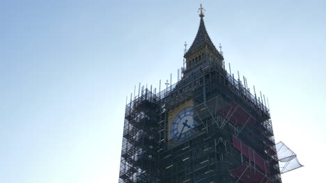 Big-Ben-Under-Construction-Covered-in-Scaffoldings,-Famous-Clock-Tower-in-London,-England