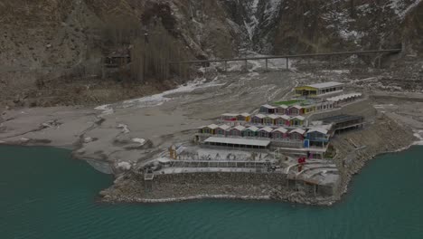 Aerial-View-Of-Luxus-Hunza-Hotel-Beside-Attabad-Lake-In-Pakistan