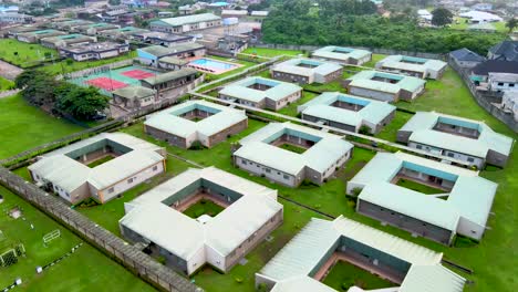 Ogere-Resort,-Ogun-State,-Nigeria--15-September-2021:-Aerial-view-of-the-green-area-in-a-resort-featuring-the-lawn,-garden-and-blocks-of-structures