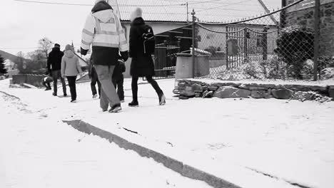 people-walking-together-on-footpath-stock-video